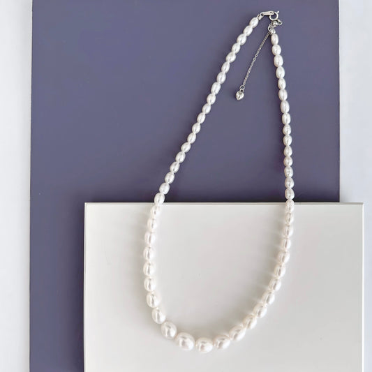 Tapered White Oval Pearl Necklace
